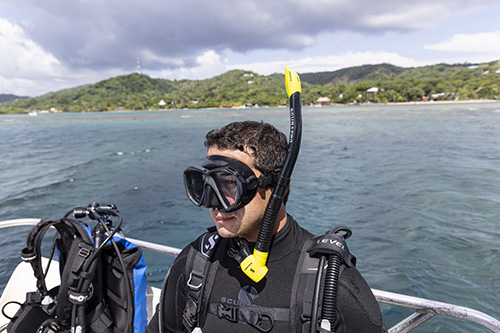 Snorkeler sitting on boat